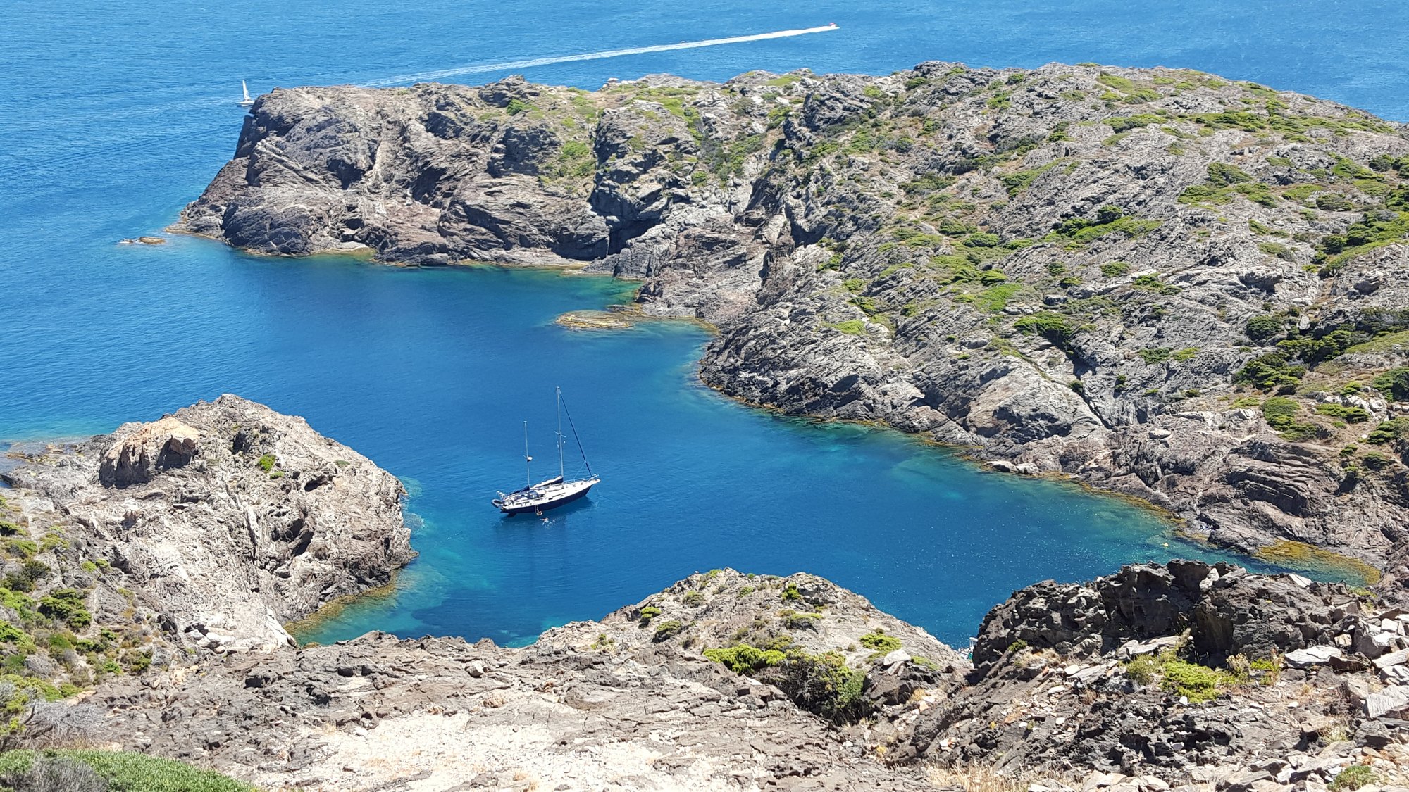 Sailing yacht at anchor in a cove of Cap de Creus, Costa Brava