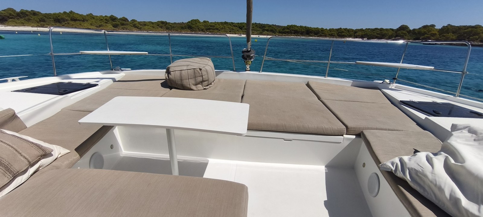 Sun lounge on a catamaran foredeck